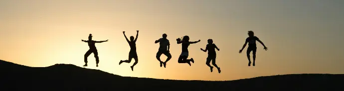 six silhouette of people jumping during sunrise